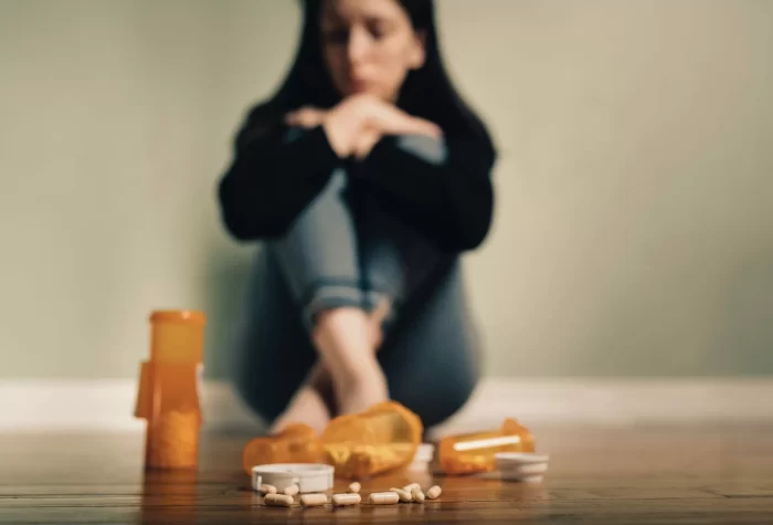 anxiety-depression-medicine-addiction-woman-drugs-sad-pills-prescription-drug-use_t20_mRr2J8